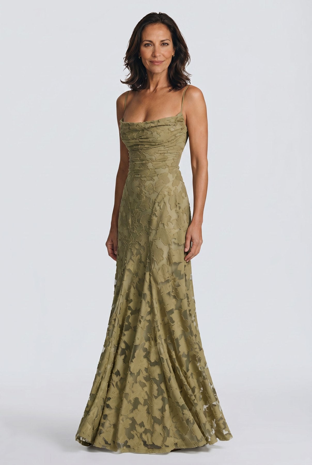 The Cynthia Ceremony Dress in sage olive, three-quarter editorial angle