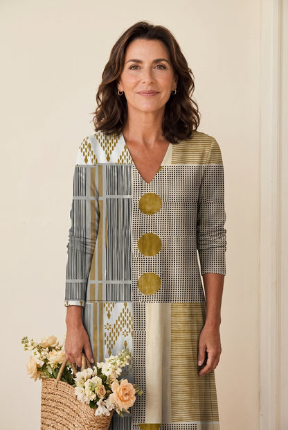 The Helen Day Dress in gray and mustard check with polka dots, V-neck wrap closeup hero